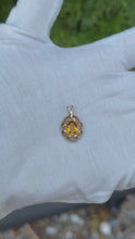 Load and play video in Gallery viewer, 10K Orange Topaz Pendant
