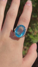 Load and play video in Gallery viewer, 14K WG Blue Topaz Ring
